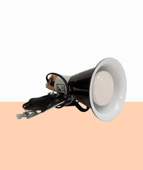 Heat lamp fixture on a beige background