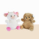 Two plush toys, one white cow with pink accents and the other brown dog, on a beige surface.